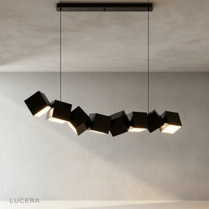 Ypsilon pendant light black finish on clean white background with LED glow