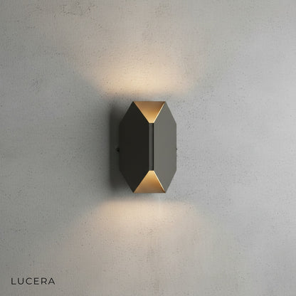 close-up of Nappe wall lamp LED light panel with brushed steel texture detail