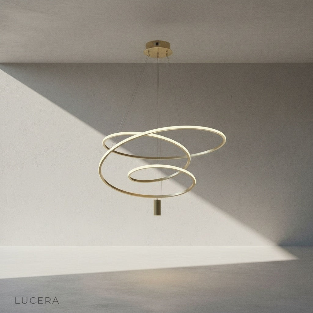 Apostle Chandelier gold abstract spiral design close-up studio view against neutral backdrop