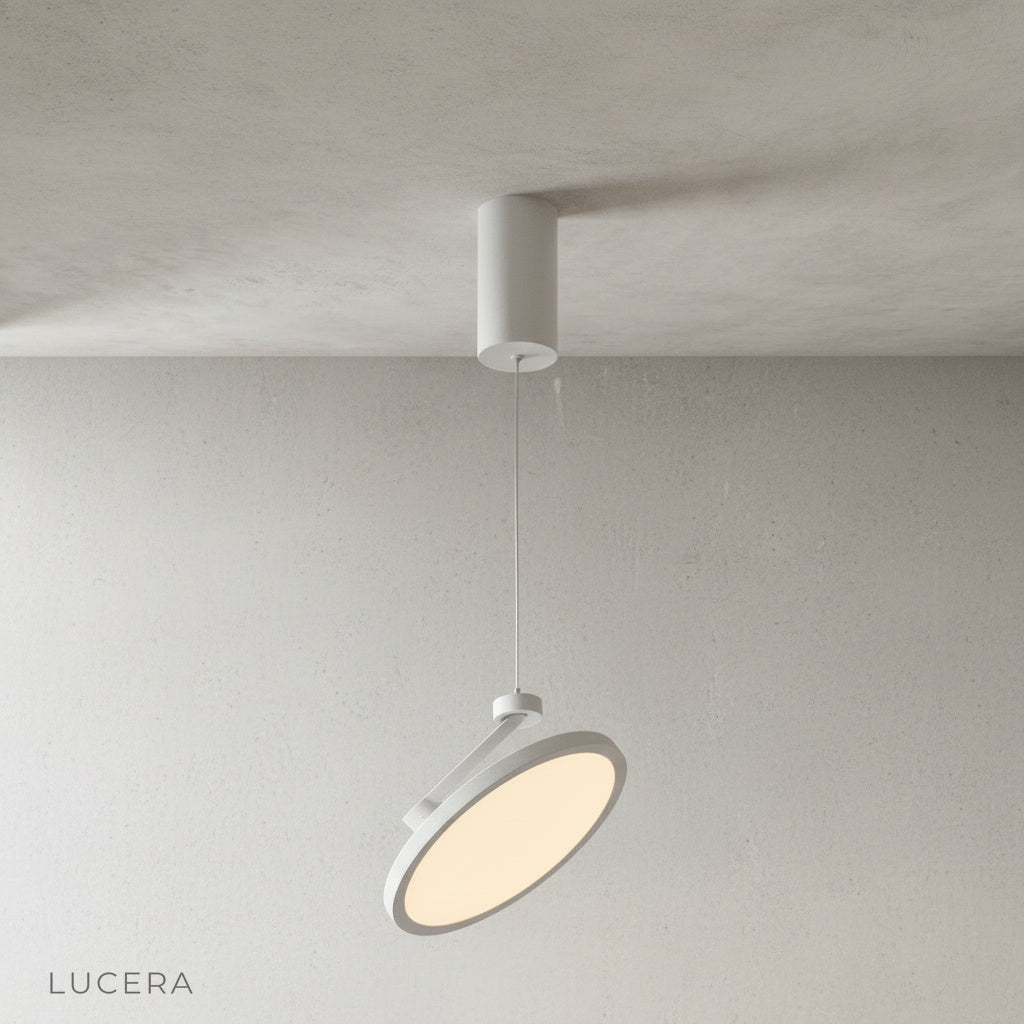 minimalist wulfenite pendant light hanging centered on clean white studio background