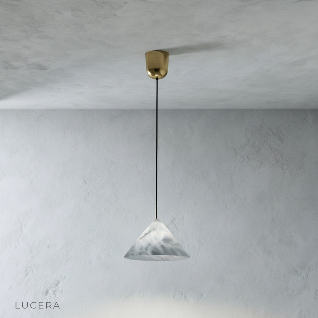 Front view of Lucera Herald pendant light showing smooth alabaster texture and elegant suspension cord