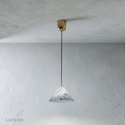 Front view of Lucera Herald pendant light showing smooth alabaster texture and elegant suspension cord