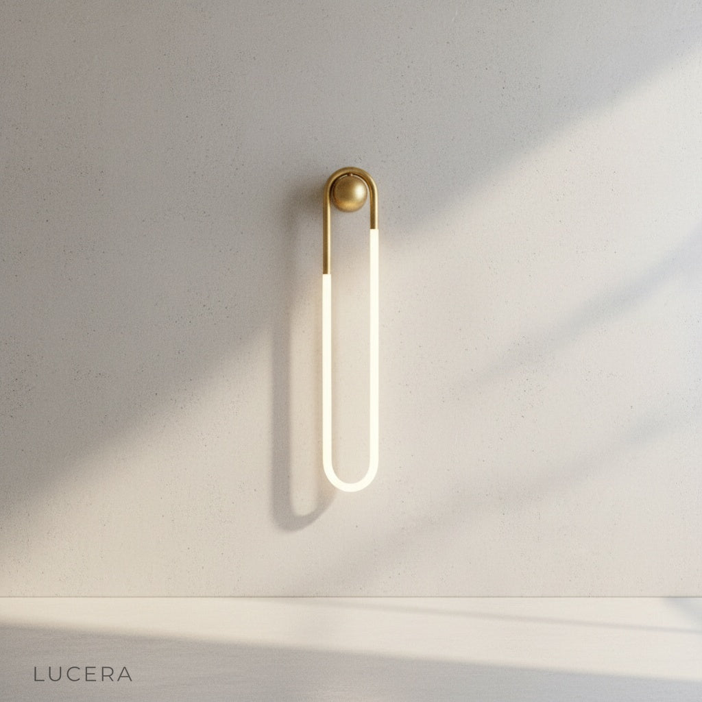 Ximena Wall Lamp side angle studio view showing elongated U-shape
