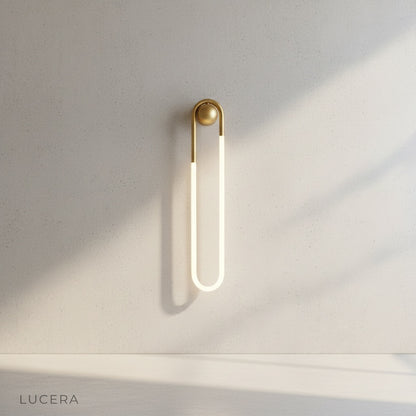 Ximena Wall Lamp side angle studio view showing elongated U-shape