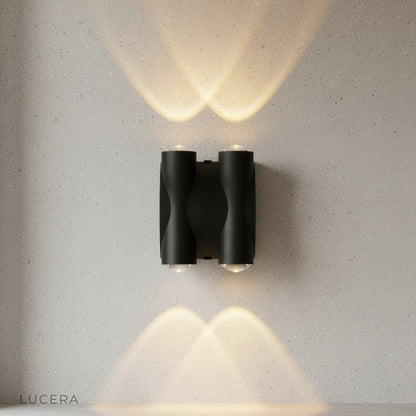 front view of minimalist aluminum outdoor wall sconce with clean lines