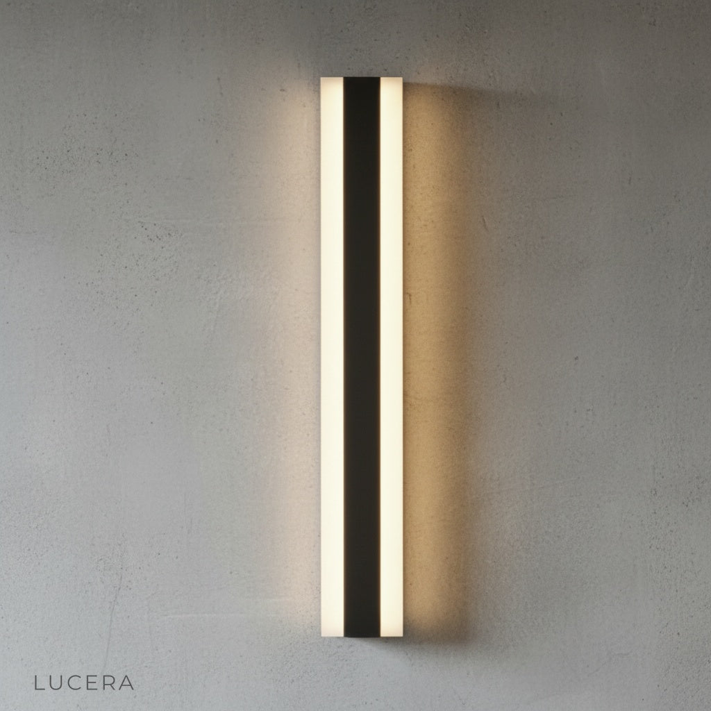 minimalist Drambuie outdoor sconce side angle studio shot with acrylic shade glow