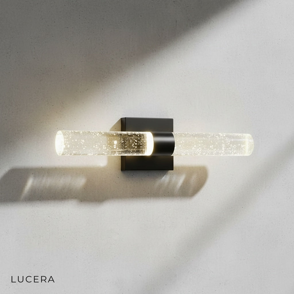 Close-up of clustered crystal bubbles on Mezza wall sconce reflecting light