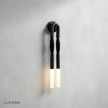 Close-up of Regula wall lamp horsehair texture and iron bracket detail