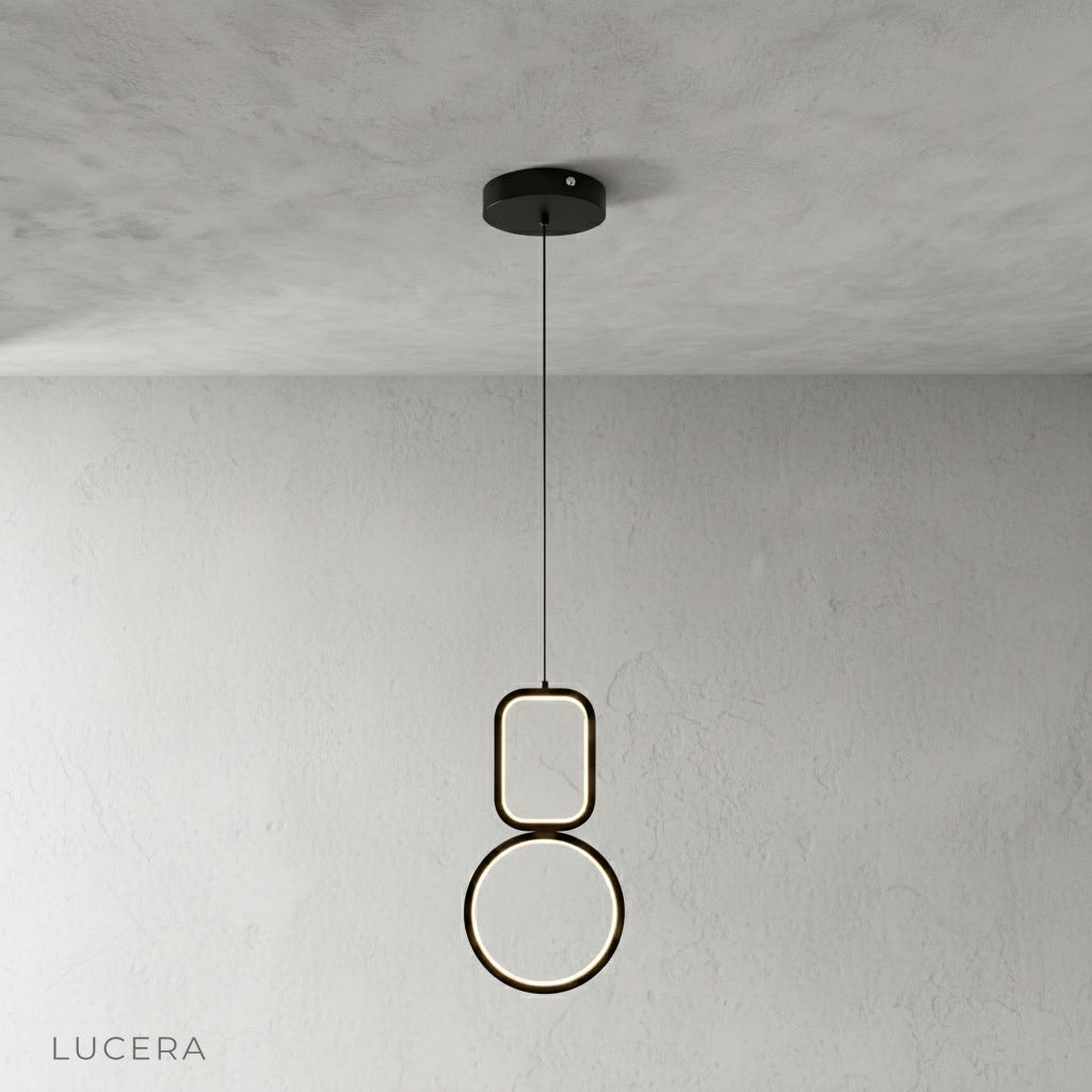Facade pendant light front view on clean white background showing sculptural design