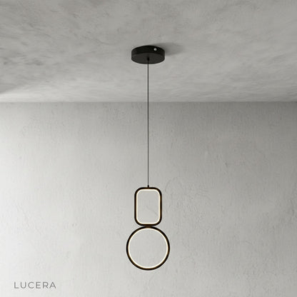 Facade pendant light front view on clean white background showing sculptural design