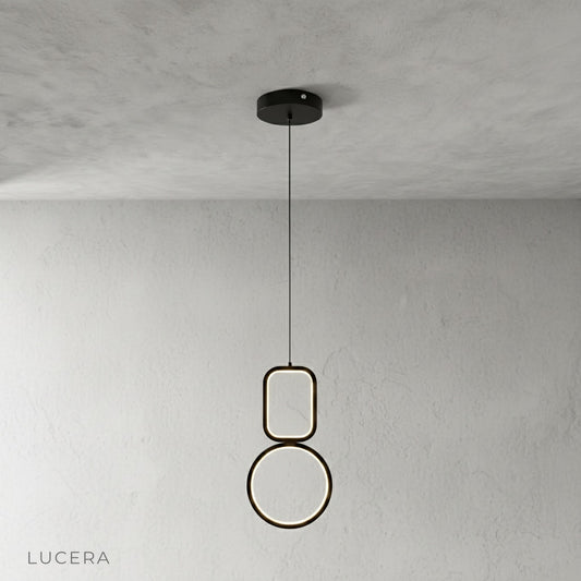 Facade pendant light front view on clean white background showing sculptural design