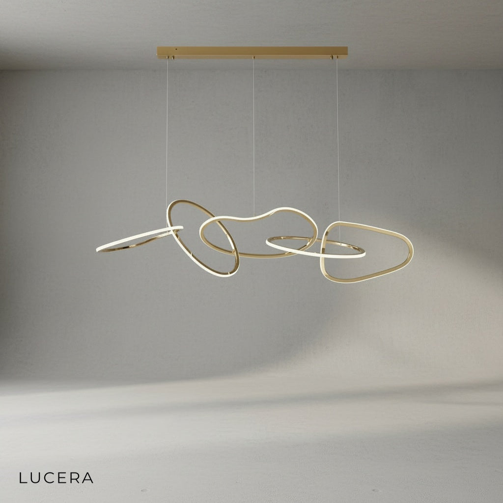 Close-up of gold finish and crystal-style elements on Bello chandelier frame
