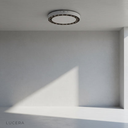 Minimalist Alonzo ceiling light on clean white background highlighting sleek edge detailing