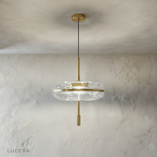 front view of sculptural glass pendant light on clean white studio background