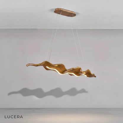 cool 6000K LED light mode on gold leaf chandelier in minimalist hallway