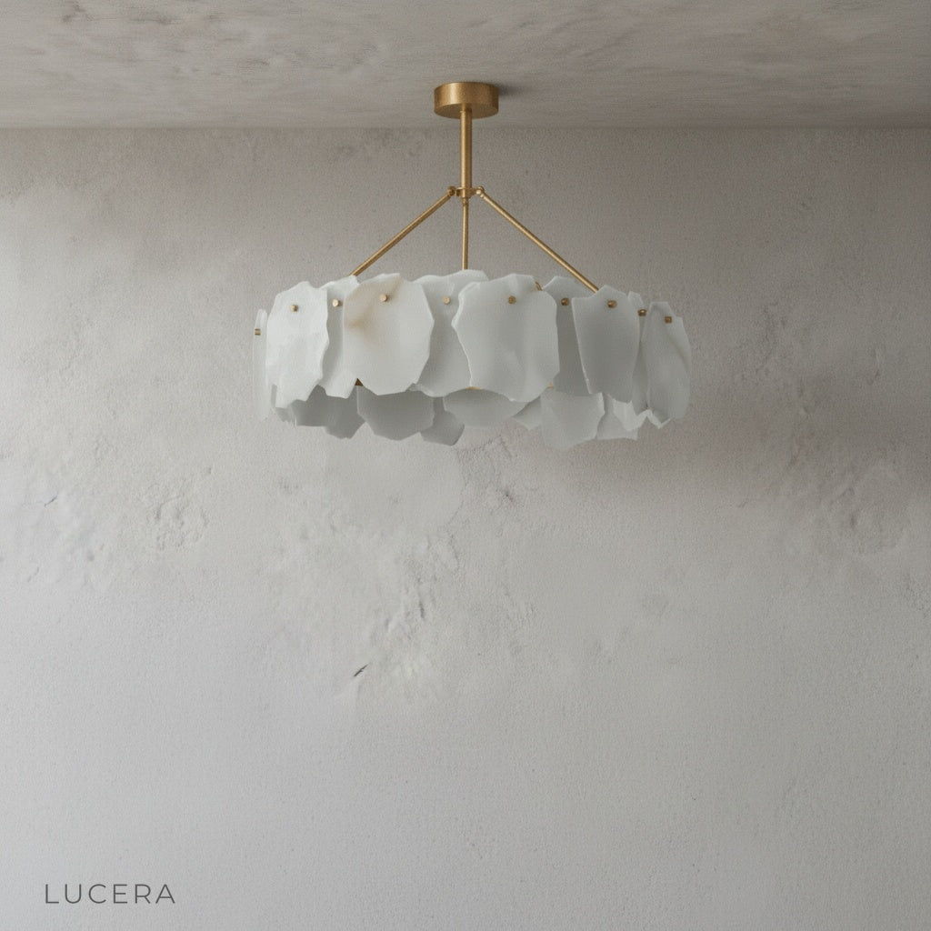 Studio view of copper chandelier with sculptural alabaster shades from side angle