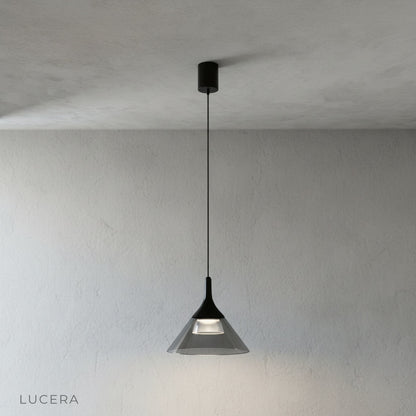 Calypso Pendant Light side view in studio, conical glass shade reflecting soft light