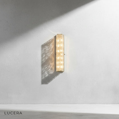 Opera Crystal Wall Lamp in covered outdoor patio setting with IP44 waterproof brass sconce lit at dusk