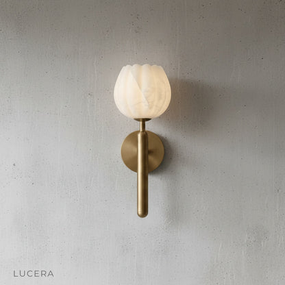 front view of the Lucera alabaster sconce against a clean white studio background