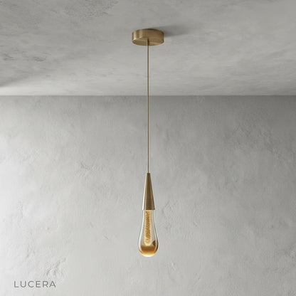 Beryl pendant light front view against neutral gray backdrop with iron frame