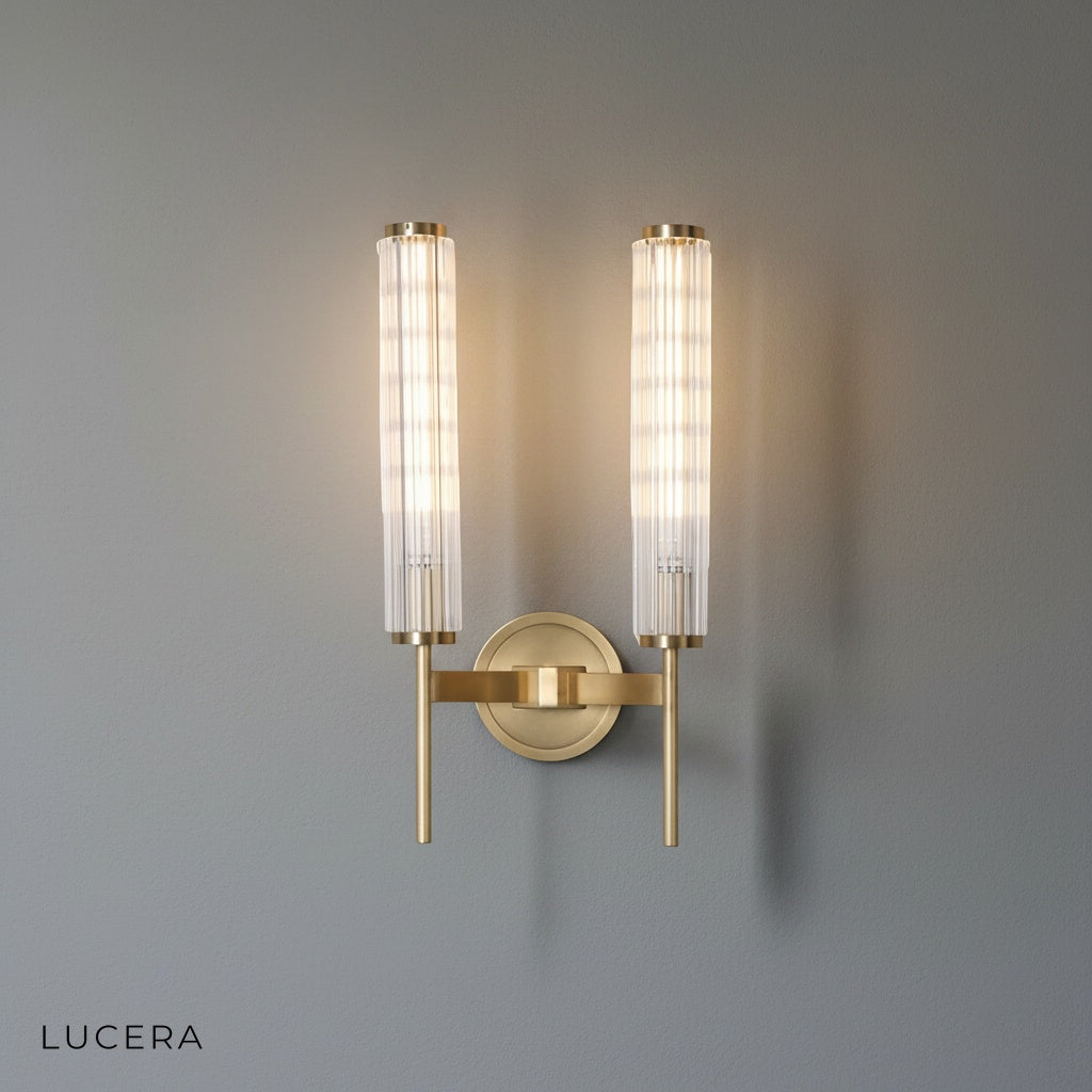 Close-up detail of Sul sconce copper metal texture and clear glass diffuser