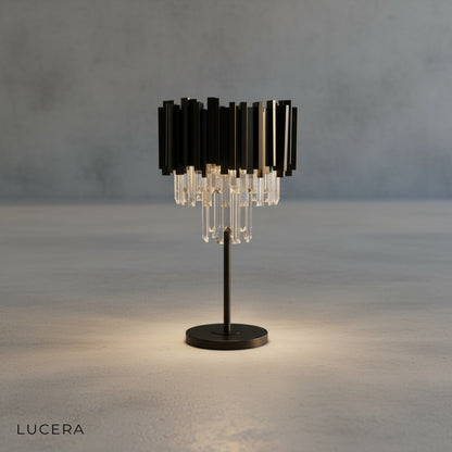 close-up of faceted black crystal base and clear crystal prisms refracting light