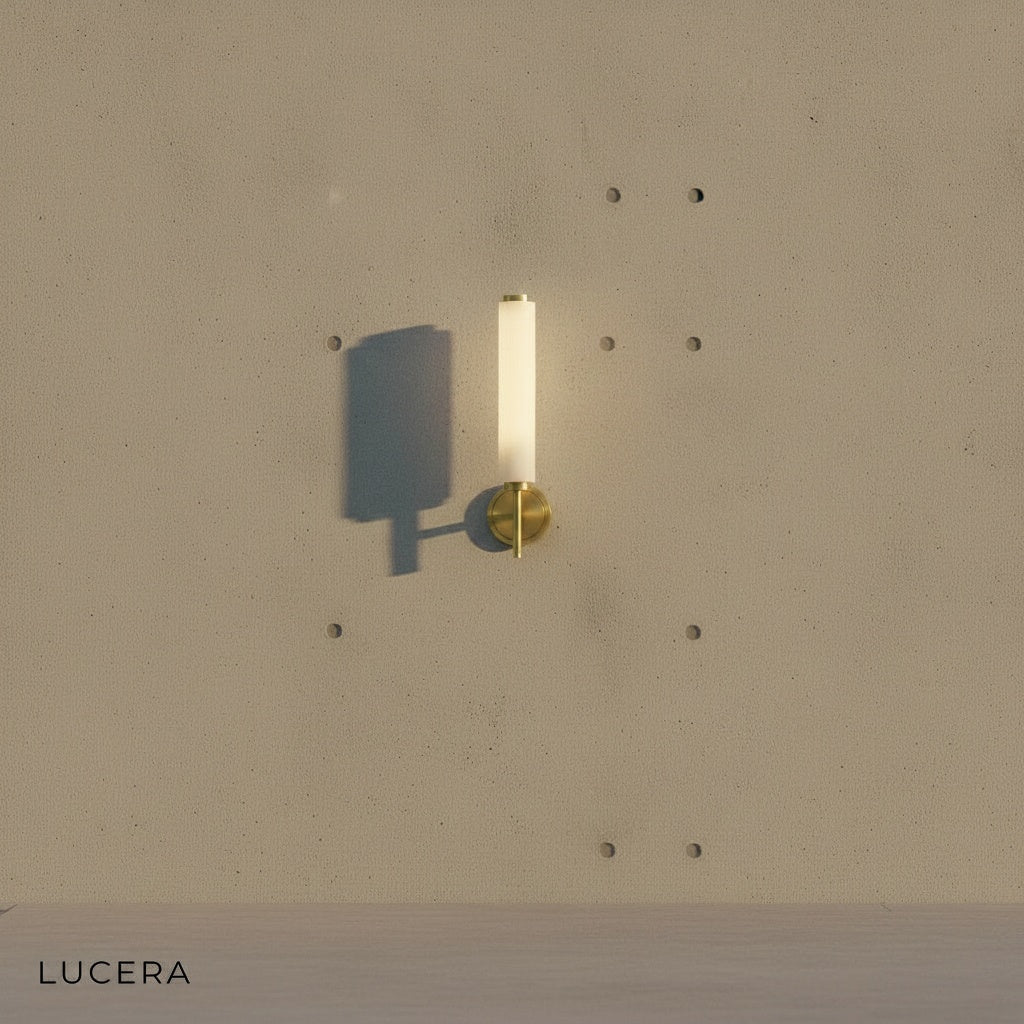 close-up of brushed copper fixture detailing and veined marble texture
