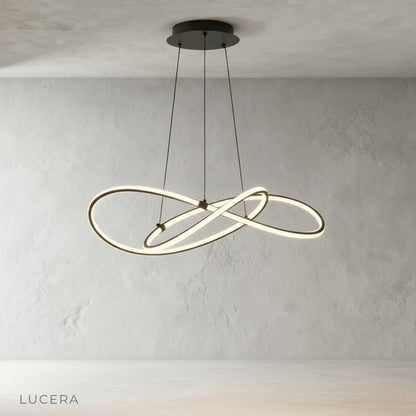 Fortuna Chandelier front view showing sculptural silicon and copper ring design in studio