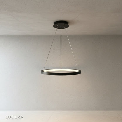 front view of lucera wash chandelier showing three-tier aluminum ring design
