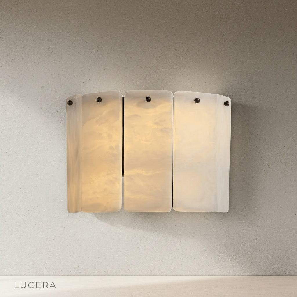 gravitas wall lamp side profile studio shot marble panels