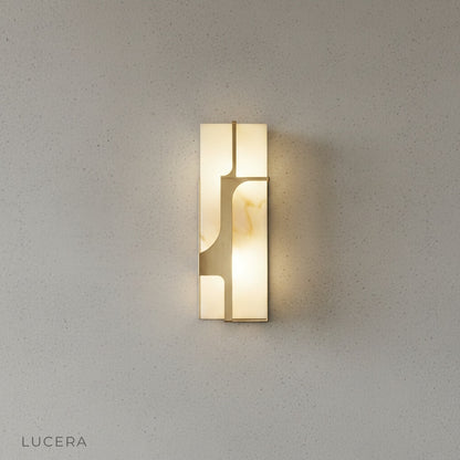 front view of Fetish Wall Lamp on neutral background showing LED light bar
