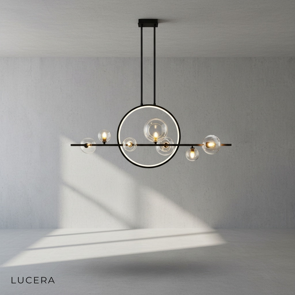close-up of hand-blown glass bubble shades on Vor chandelier showing soft light diffusion