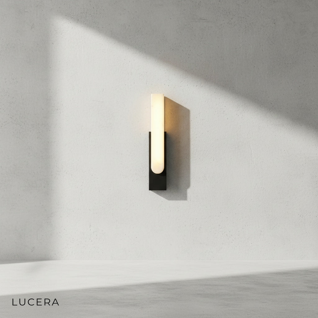 close-up of polished marble texture on Rumore wall lamp surface