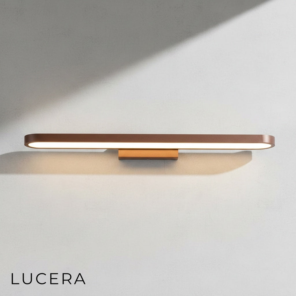Sforzando brown wall lamp mounted above a bedside table in a stylish bedroom
