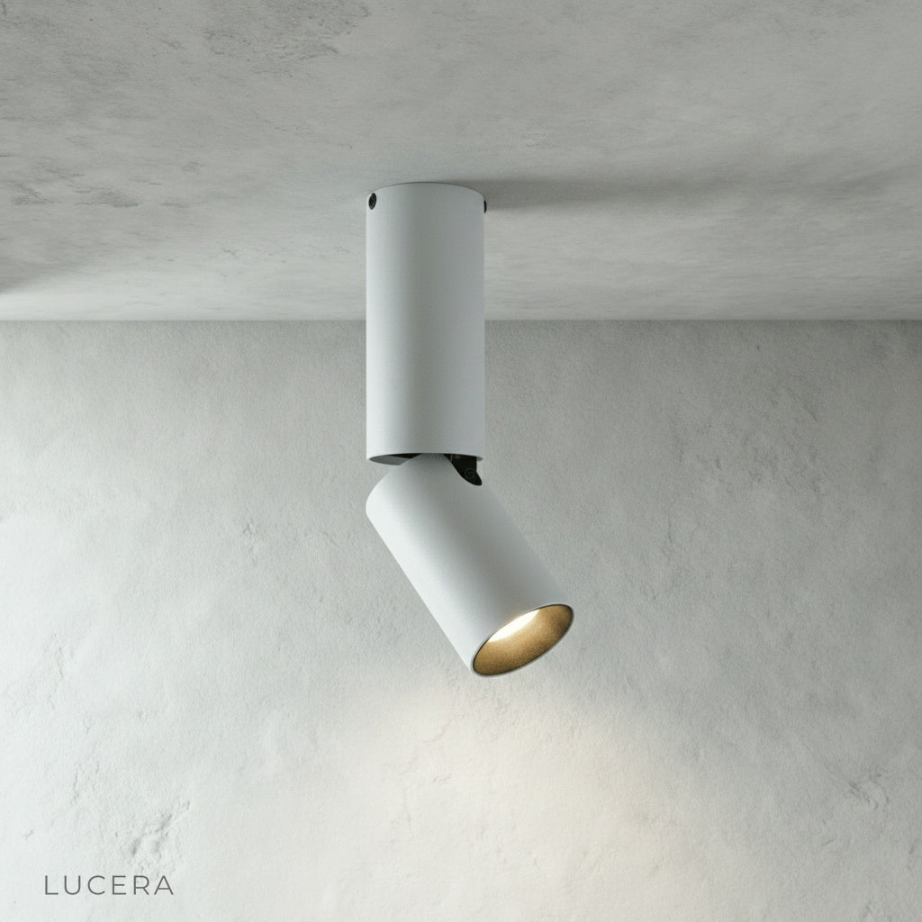 minimalist Bewitch ceiling light on clean white background showing front view of cylindrical fixtures