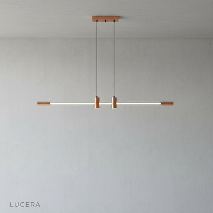 Studio view of Gideon pendant light showing adjustable chain and sleek metal canopy