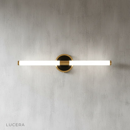 minimalist studio view of linear Rosewood wall lamp with soft diffused glow