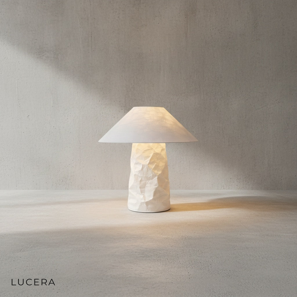 Close-up detail of the organic textured base of the citrine wabi-sabi paper lamp