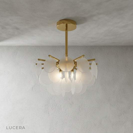 Art Deco chandelier with clear glass discs on clean white background