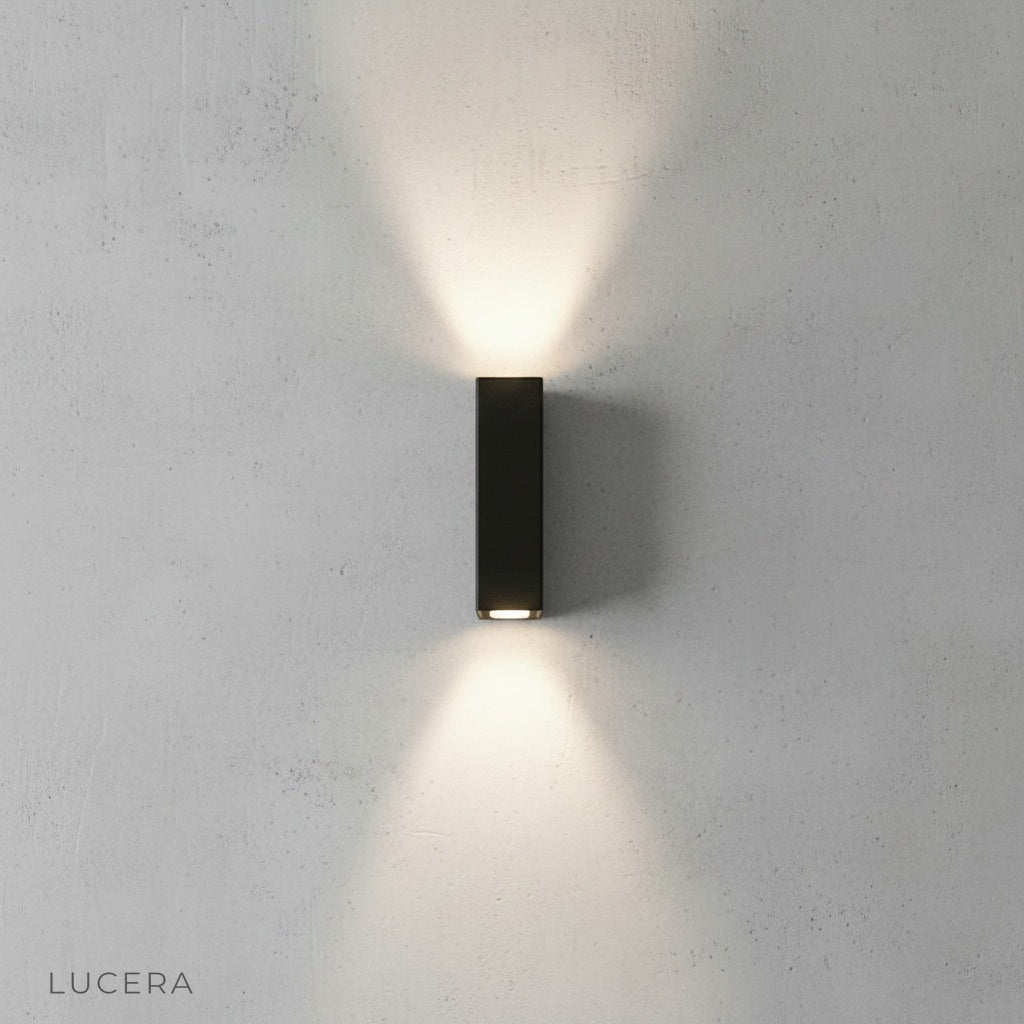 gold wall lamp front view on clean white background showing brushed finish