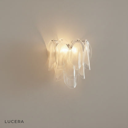 Close-up of Carme Murano glass panels with soft light diffusion and sculptural Italian-inspired curves