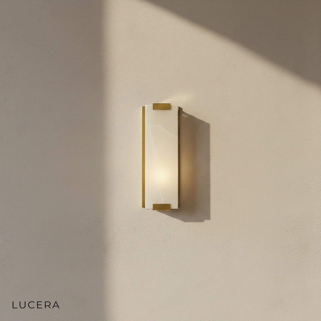 luxury copper-marble LED sconce in minimalist hallway with soft shadows