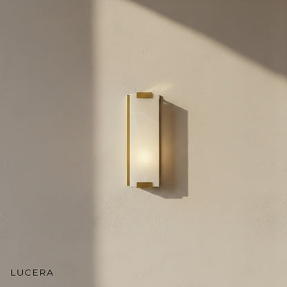 luxury copper-marble LED sconce in minimalist hallway with soft shadows