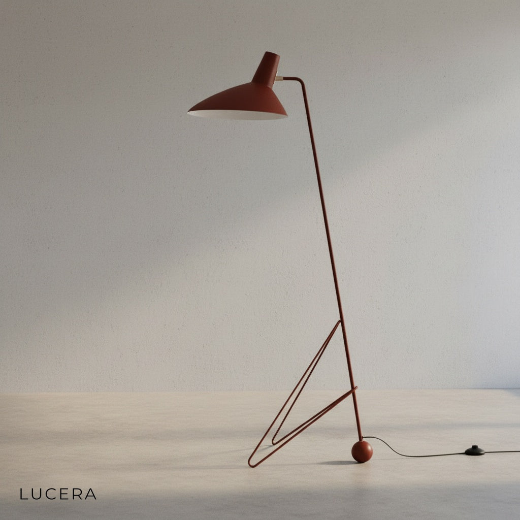 close-up of matte iron tripod base and slender frame of floor lamp