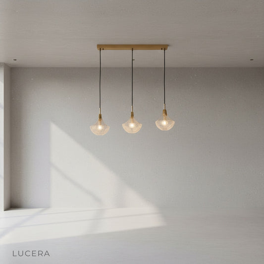 Leggero pendant light front view ribbed glass diffusers copper ceiling mount clean lines