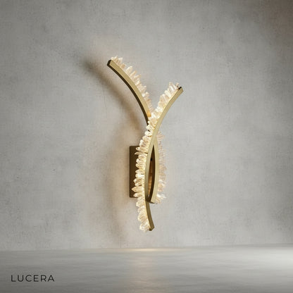 golden wall lamp illuminating a cozy hallway with elegant contemporary decor