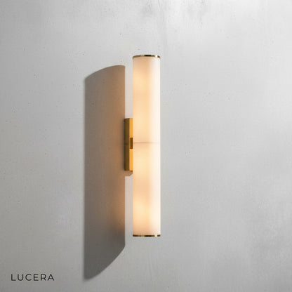 close-up of white marble texture and polished brass details on Rafale lamp