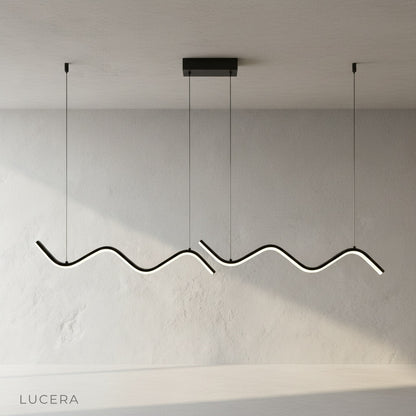 studio shot of sculptural aluminum and iron Melisande pendant light on clean background