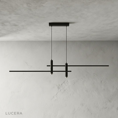 Front view of red pendant light fixture with adjustable cord, studio lighting, neutral backdrop