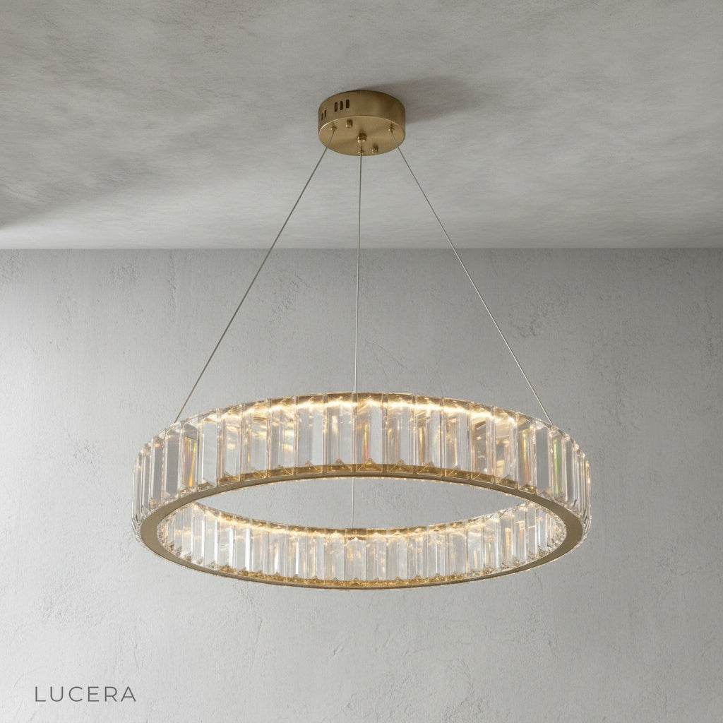 front view of Lucera Carmelite chandelier showing adjustable wire and brass finish